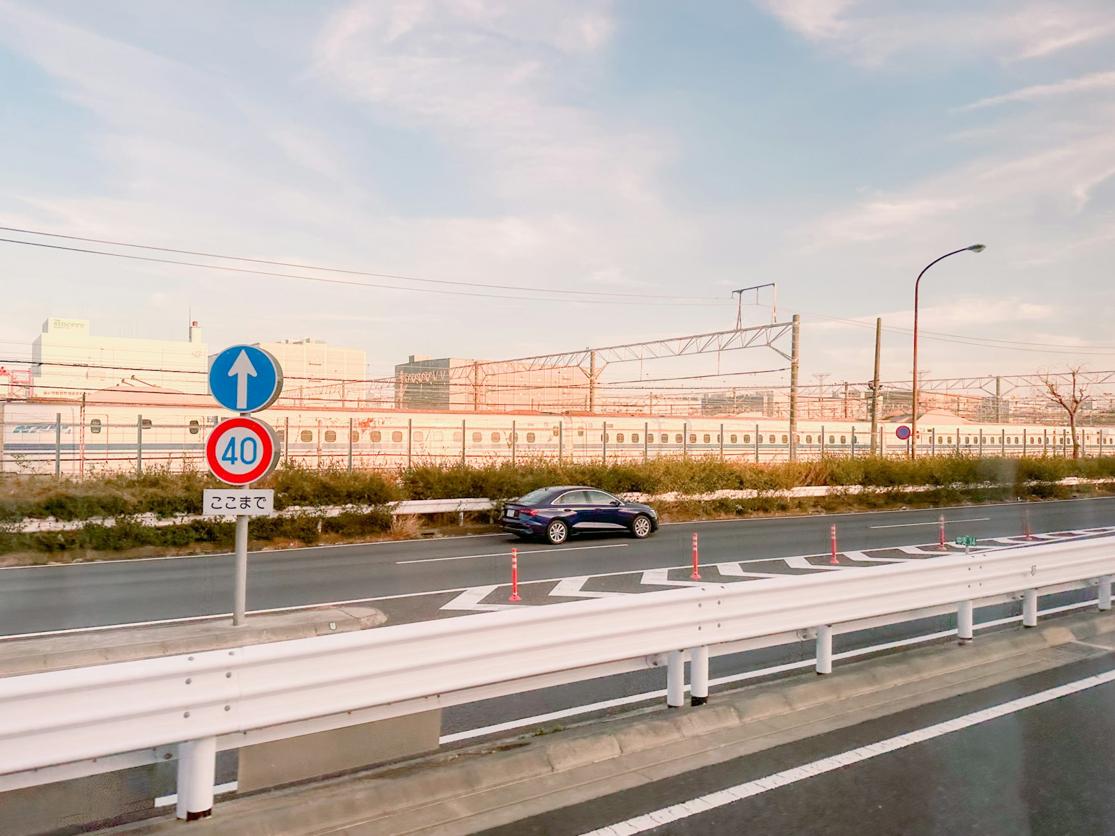 Expressway in Tokyo with an overhead road sign