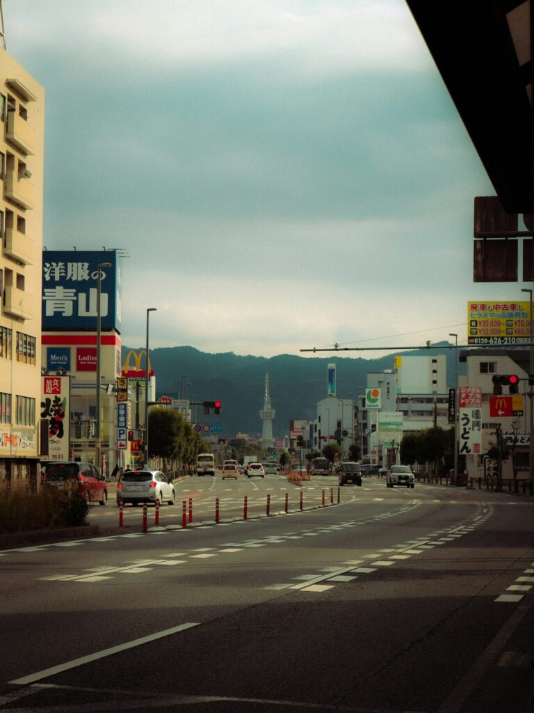 A street in Beppu leading toward the mountains
