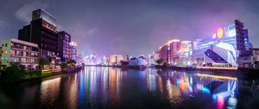 City lights near Canal City Hakata reflected in the water at night