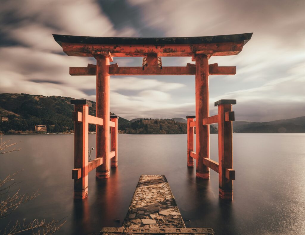 The red Torii of Peace standing in the water of Lake Ashi at Hakone Shrine