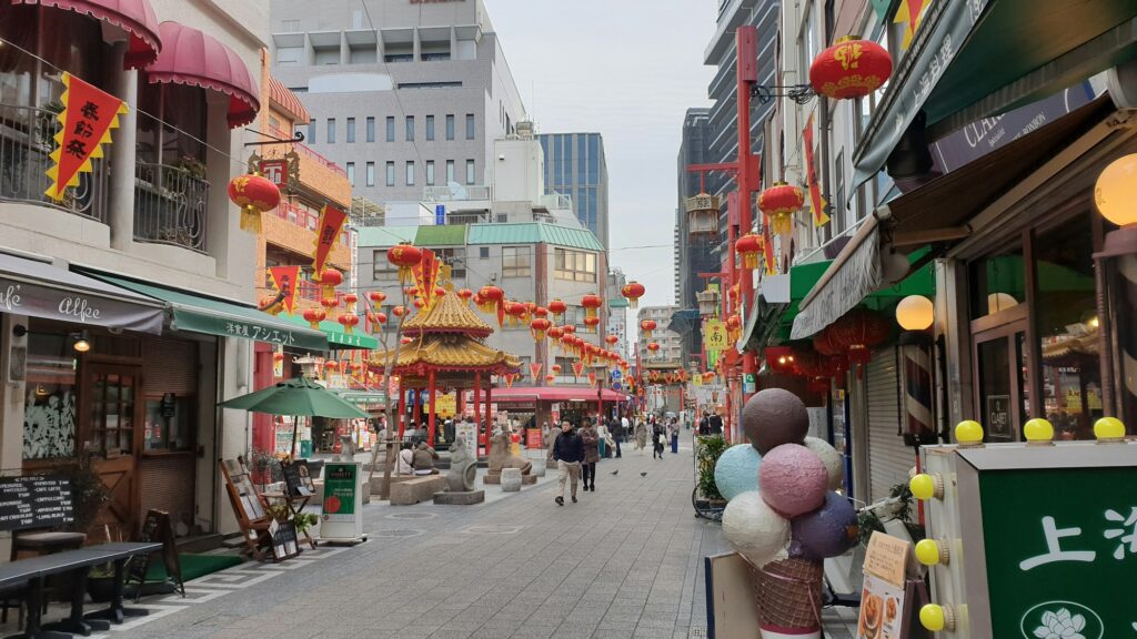 Red lanterns and shops along the main street of Nankinmachi, Kobe Chinatown