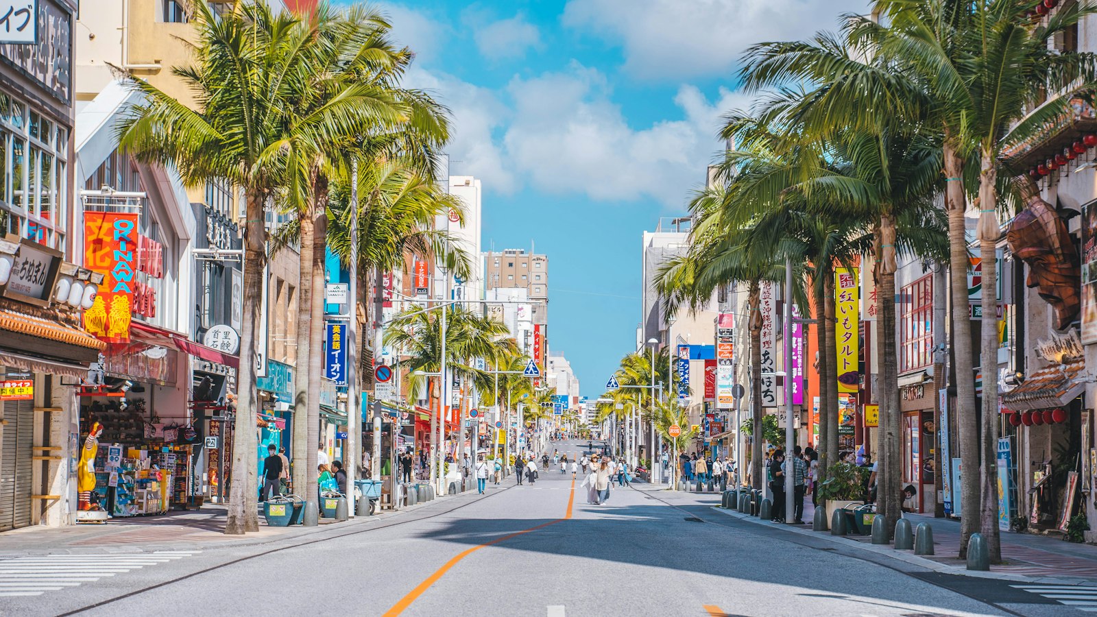 Palm-lined Kokusai Street in Naha, Okinawa