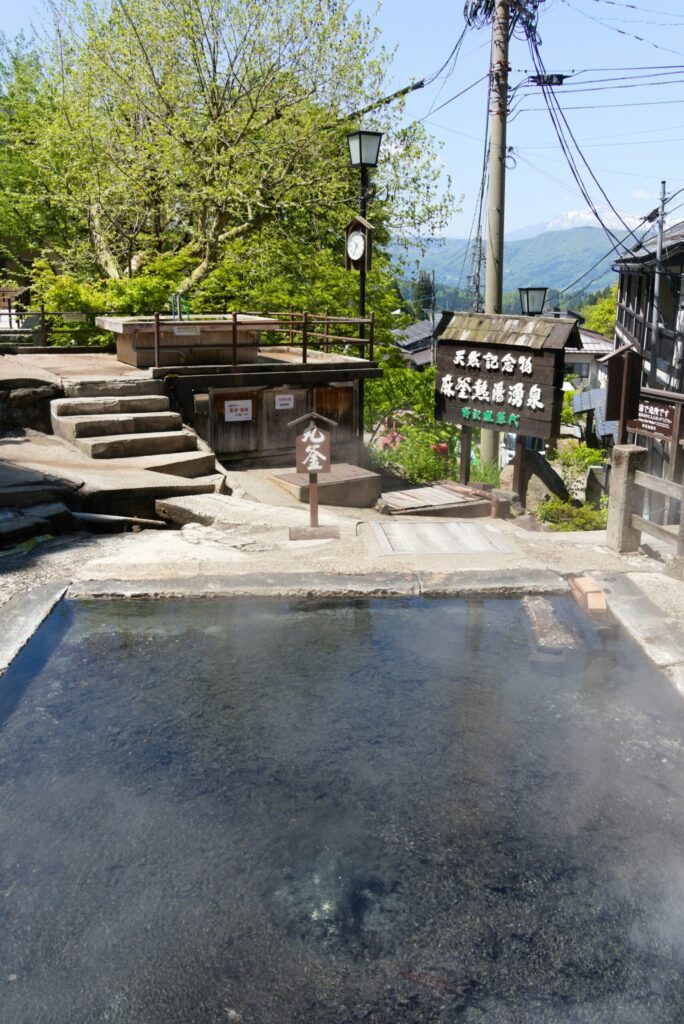 A steaming hot spring source in Nozawa Onsen village