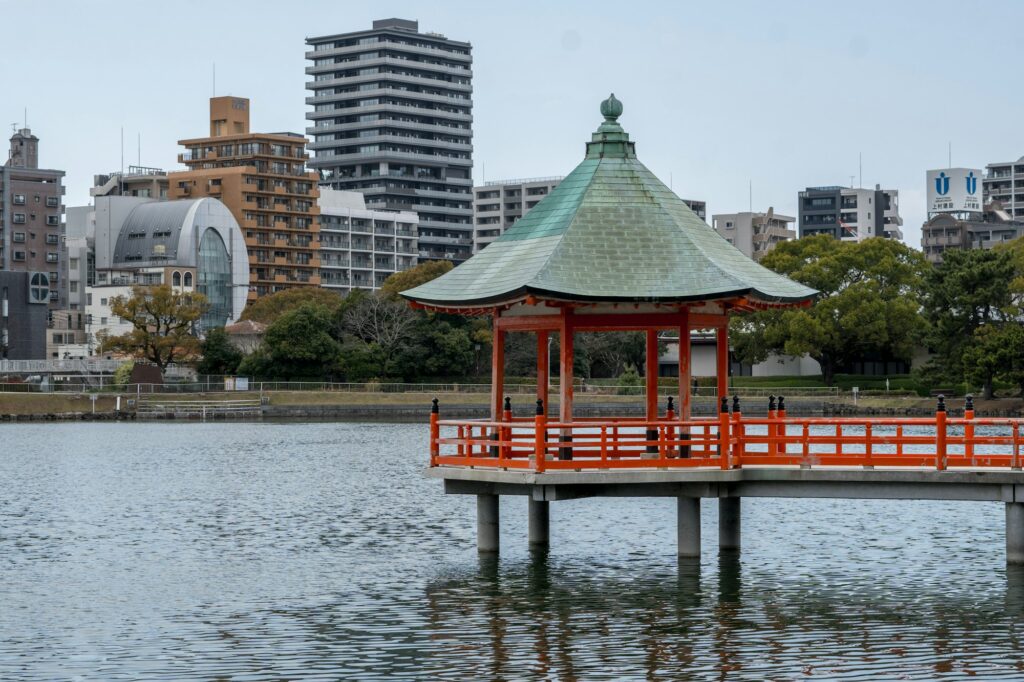 The red Ukimido pavilion on the lake in Ohori Park, Fukuoka