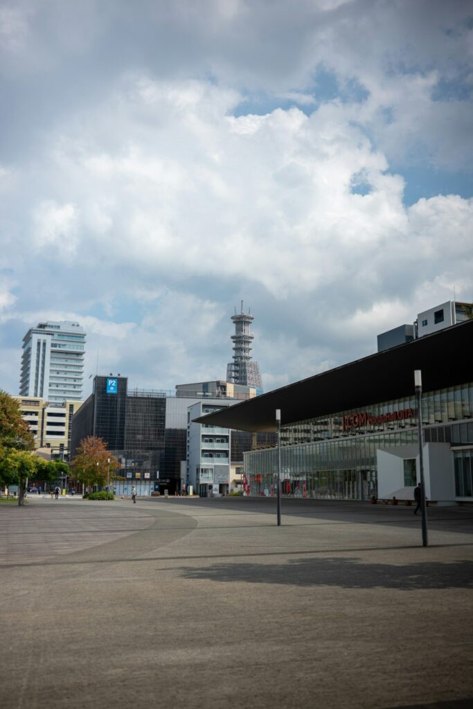 Hoult Hall Oita and a lattice tower near Oita Station