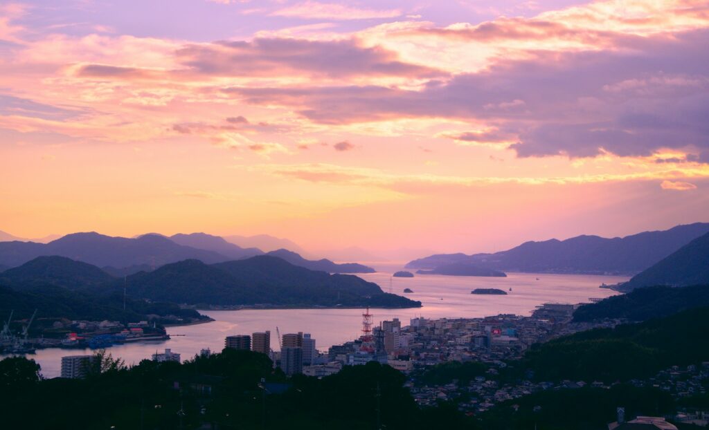 Sunset over the hillside port town of Onomichi and the Seto Inland Sea