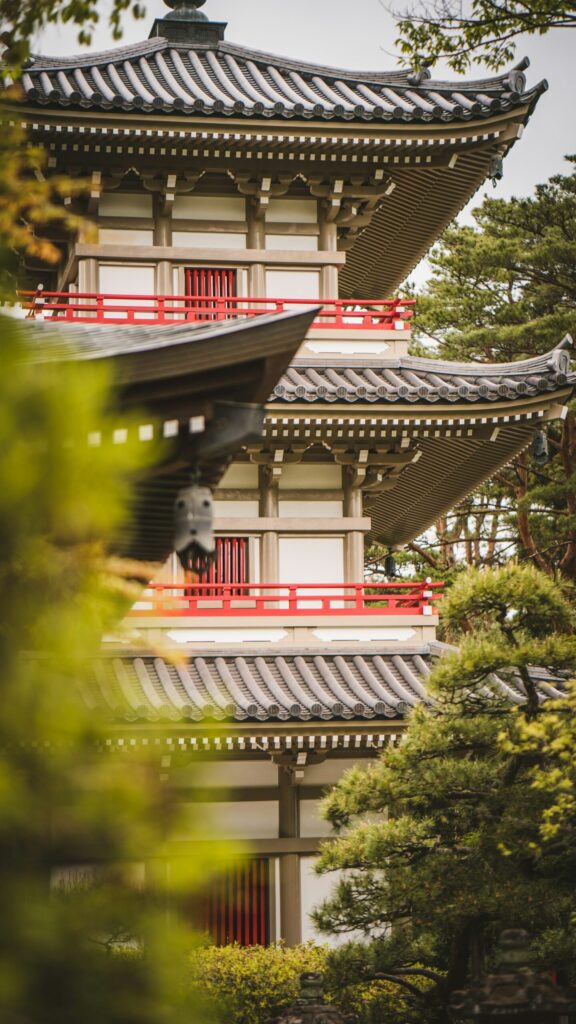 Red and white eaves of the pagoda at Rinno-ji Temple in Sendai