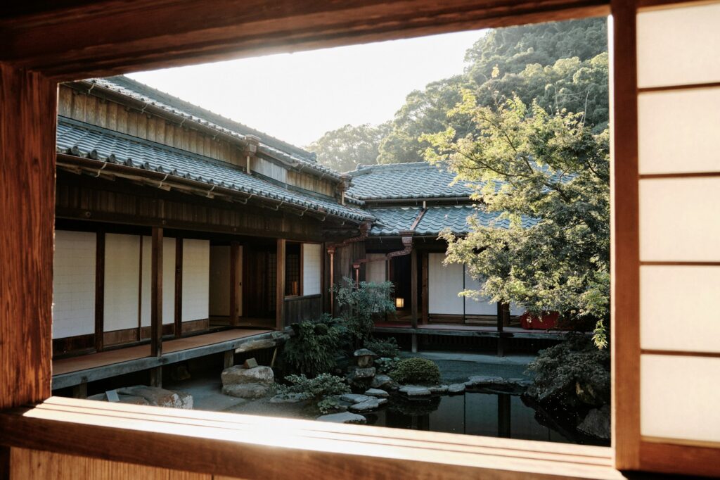 A traditional room at Sengan-en in Kagoshima looking out onto a garden courtyard