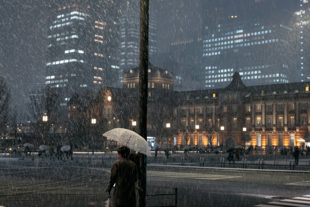 Snow outside Tokyo Station: winter trips bring both ski fun and slippery sidewalks.