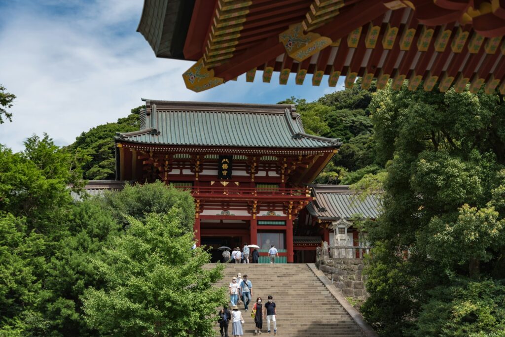 Vermilion main hall of Tsurugaoka Hachimangu Shrine above its stone stairway in Kamakura