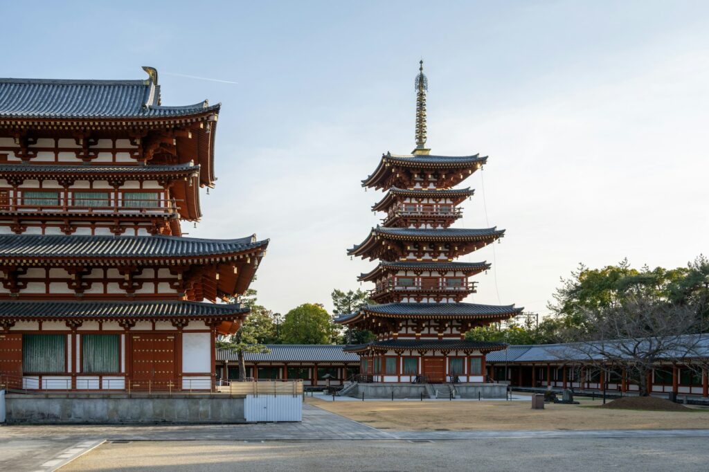 The vermilion main hall and three-story pagoda of Yakushi-ji Temple in Nara