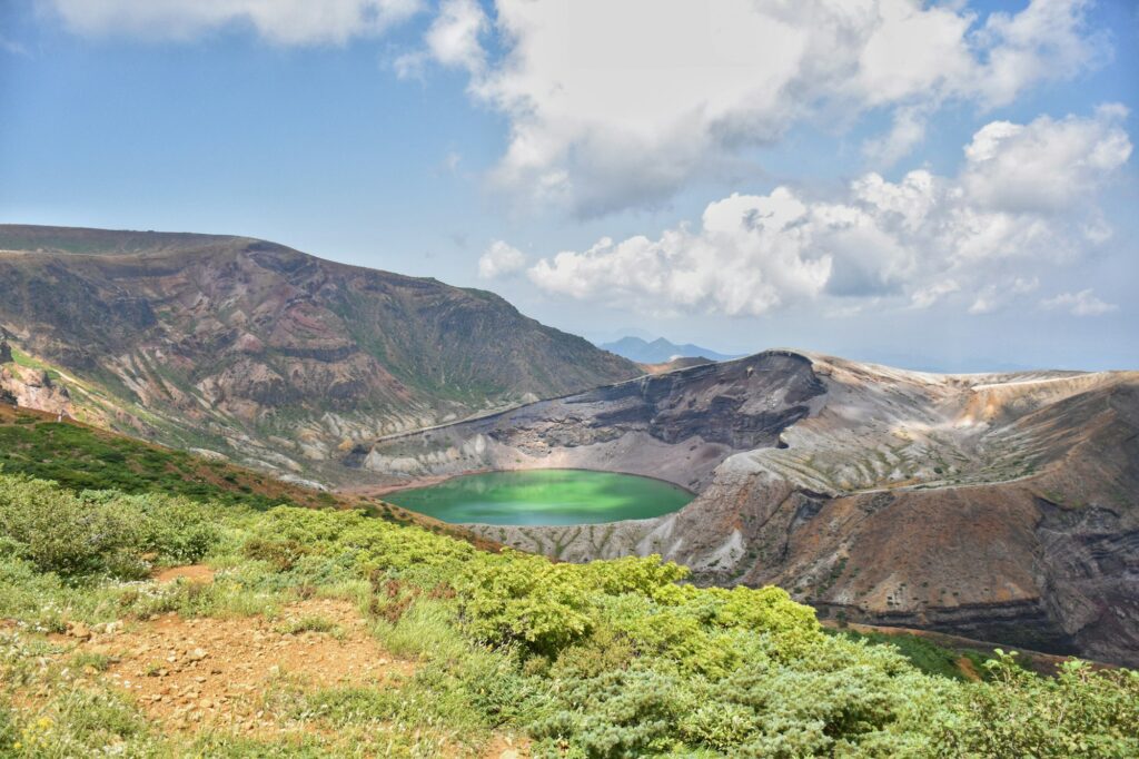 The emerald Okama crater lake on Mount Zao